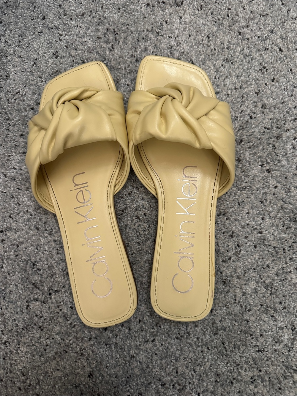 Calvin Klein Knotted Slide Sandals in Pale Yellow